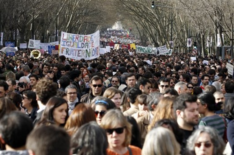 Thousands crowd Lisbon's main Liberdade Avenue on Saturday.